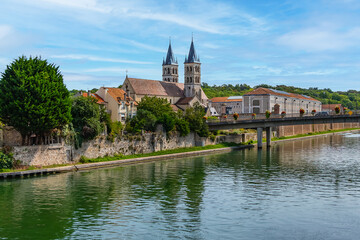 Beautiful view of the banks of the Seine River in the city of Melun and the Collegiate Church of...