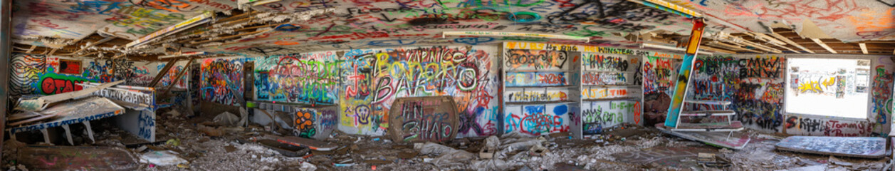 panorama of a graffiti filled building