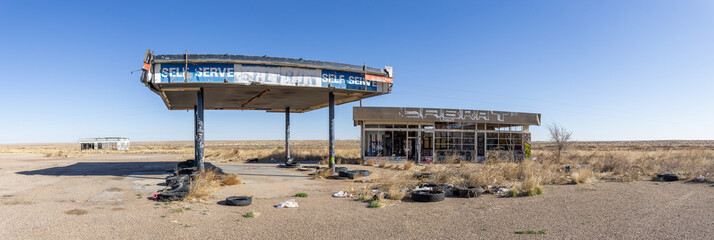 abandoned gas station in the desert