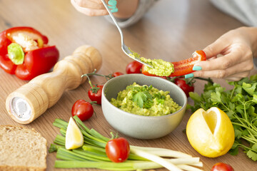 Homemade bowl of guacamole dip with fresh ingredients - 760801480