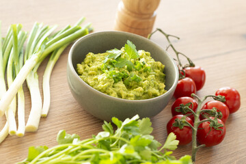 Homemade bowl of guacamole dip with fresh ingredients - 760801494