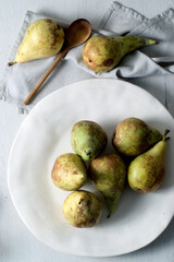 Still life of a dish with pears conference seen from above