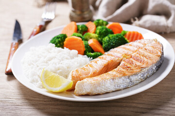 plate of grilled salmon, rice and vegetables - 760815420
