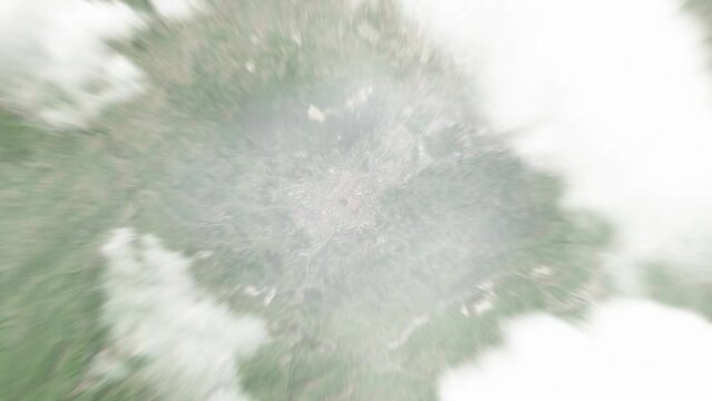 Earth zoom in from space to Oviedo, Spain. Followed by zoom out through clouds and atmosphere into space. Satellite view. Travel intro. Images from NASA