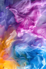 Vertical Beautiful abstraction of liquid paints in slow blending flow mixing together gently.