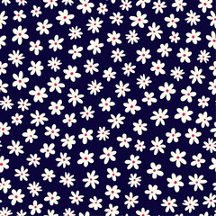 Retro floral seamless repeat pattern. Random placed, vector botanical aop all over surface print on dark blue background.