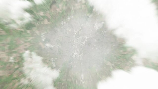 Earth zoom in from space to Leicester, United Kingdom. Followed by zoom out through clouds and atmosphere into space. Satellite view. Travel intro. Images from NASA