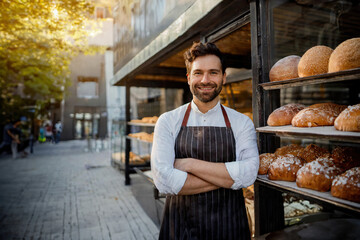 Proud male baker standing confidently outside his urban bakery, embodying the spirit of small business success in the city