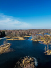 view to the lake in cold climate, winter and early spring