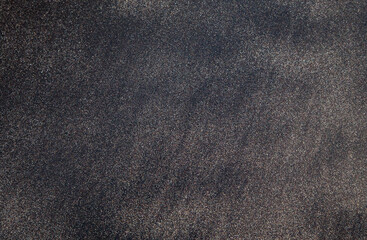 Black sand on a beach in Tenerife at Canary Islands
