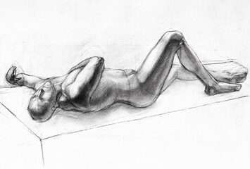 educational drawing of lying nude male model on podium drawn by hand by charcoal on white paper - 760851439