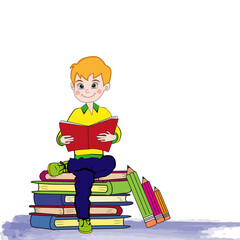 Niño feliz sentado con un libro.