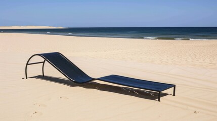 Fototapeta na wymiar a lounge chair sitting on top of a sandy beach next to a large body of water on a sunny day.