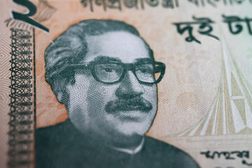 Closeup portrait of President and father of Nation Sheikh Mujibur Rahmanon on old Bangladesh Taka currency banknote