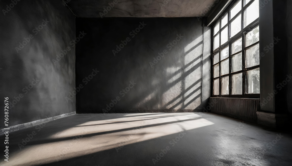 Poster a room with a window and a black rough plaster wall, smooth concrete floor. the room is empty and th