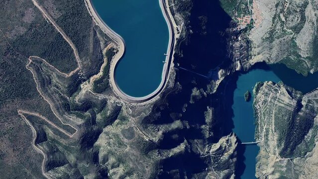 The Cortes La Muela Pumped Stroge Hydropower Plant is the largest Pumped storage power plant of Europe in Spain and Cortes II Dam aerial drone view. 
