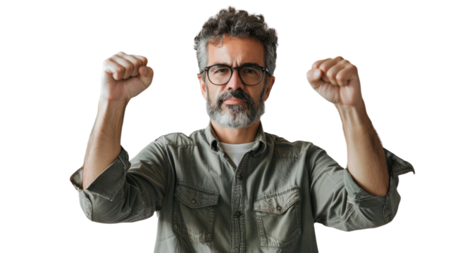 A bearded man with glasses raising his fists in a show of determination and strength