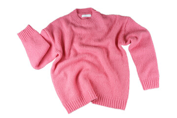 Pink flying crumpled women's autumn knitted sweater isolated on white, transparent background. Creative clothing concept, trendy fall winter cozy creasy jersey pullover. Fashion, sale, autumn discount