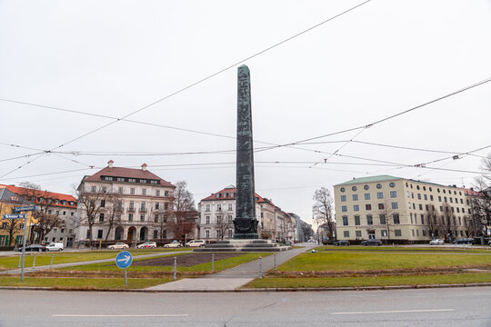 Black obelisk situated in the middle of Karolinenplatz in Maxvorstadt district of Munich, Germany
