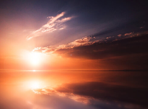 calm lake sea water at sunset  or sunrise