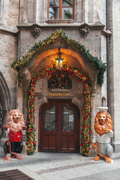 Entrance of the Ratskeller restaurant with Christmas decorations, Munich, Germany