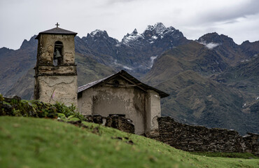 Fototapeta na wymiar church in mountain clouds