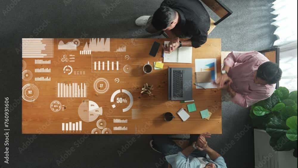 Poster top view of smart business team looking at laptop while clapping hand and putting hand together at t