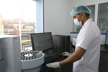 science laboratory with hplc, spectrometer, gc, uv, ir in background. hi tech latest machines and equipments in a Science experiment lab for research analysi, clinical trial study. fda approved labs	