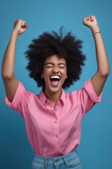 Happy young African American woman with raising her arms