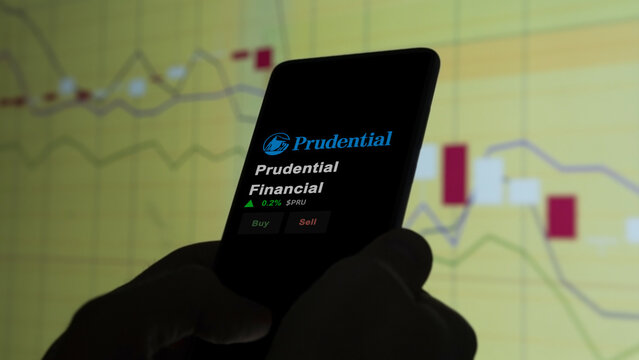 Prudential Financial logo on the screen of an exchange. Prudential Financial price stocks, $PRU on a device, Newark, New Jersey. 