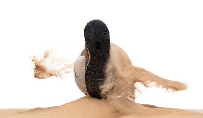 Shoe shooting Classic sport football ball on sand pile over white background isolated. Sand...