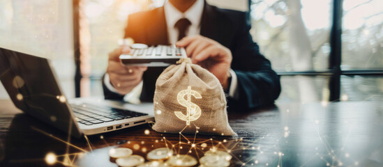 Fototapeta premium The businessman holds a money bag, representing financial planning.