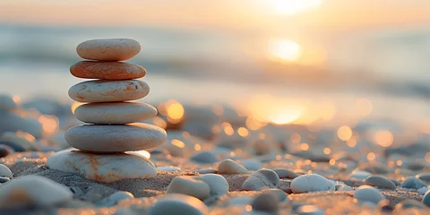 Foto auf Acrylglas Tranquil stack of zen stones on a beach at sunrise, symbolizing balance and peace © bluebeat76