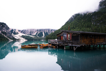 Fototapeta premium Lago di Braies Boat House at Sunrise, Pragser Wildsee, Dolomites, Italy