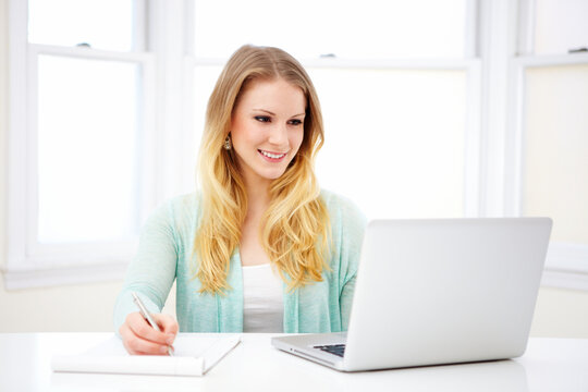 Young Woman Working on a Laptop