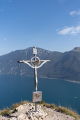 Monte Bestone peak overlooking Lake Garda and the Alps