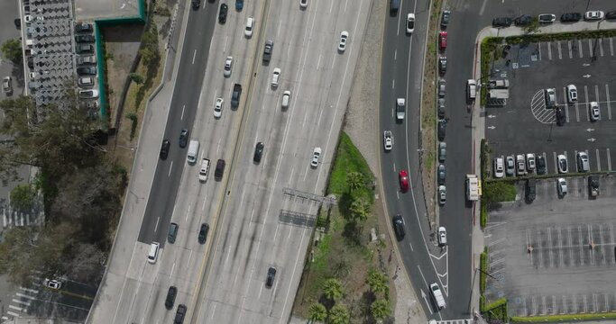 Top down birds eye view of freeway traffic in downtown Los Angeles