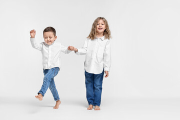 Naklejka premium Cute little children on white background. Space for text