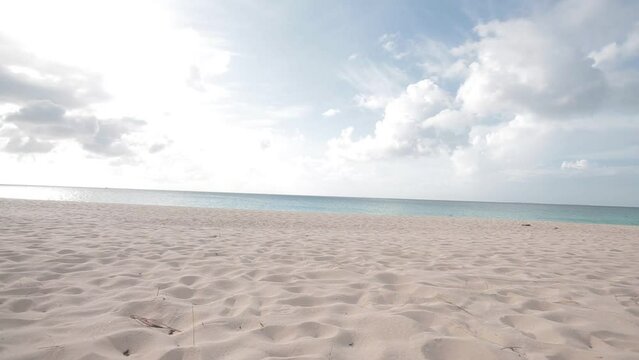POV walking in sandy tropical beach private access from hotel resort 