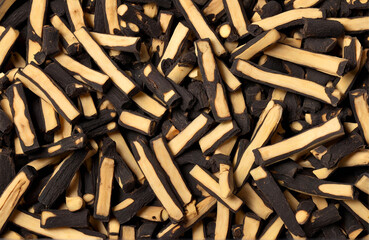 Liquorice roots , cut out on white background