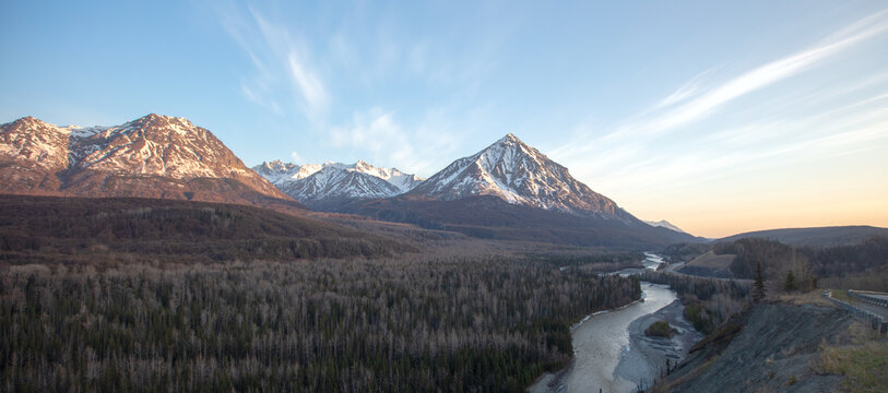 Matanuska River flowing  past Chugach Mountains near Palmer Alaska United States