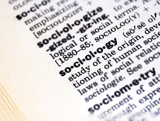 Closeup of the word sociology in the dictionary