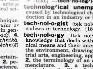 Closeup of the word technology in the dictionary