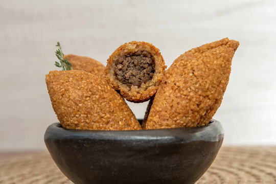 Kibbet Lebanese food, traditional Arabic snack, Kibbe is a fried food filled with minced meat, characterized by its ovoid shape finished with two pointed ends.