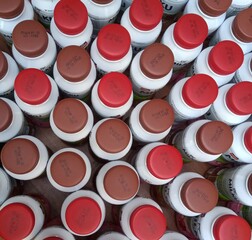 stacked bottles of drink bottles and in the photo from above, 