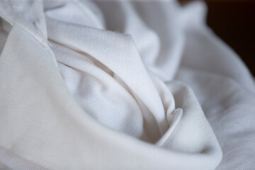 White fabric texture background close up, soft focus, vintage tone.