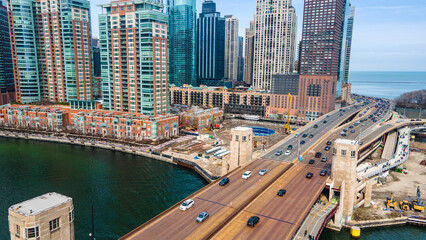  An aerial drone  view of a bustling Chicago metropolis The cityscape is reflected in the serene...
