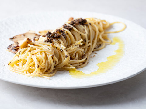 Truffle oil mushroom pasta on plate