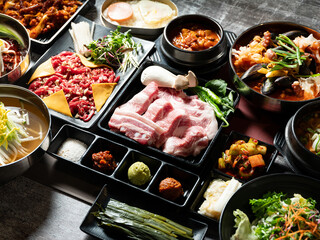 Fresh raw meat and various foods