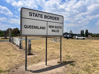 The official state border sign between New South Wales and Queensland Australia
